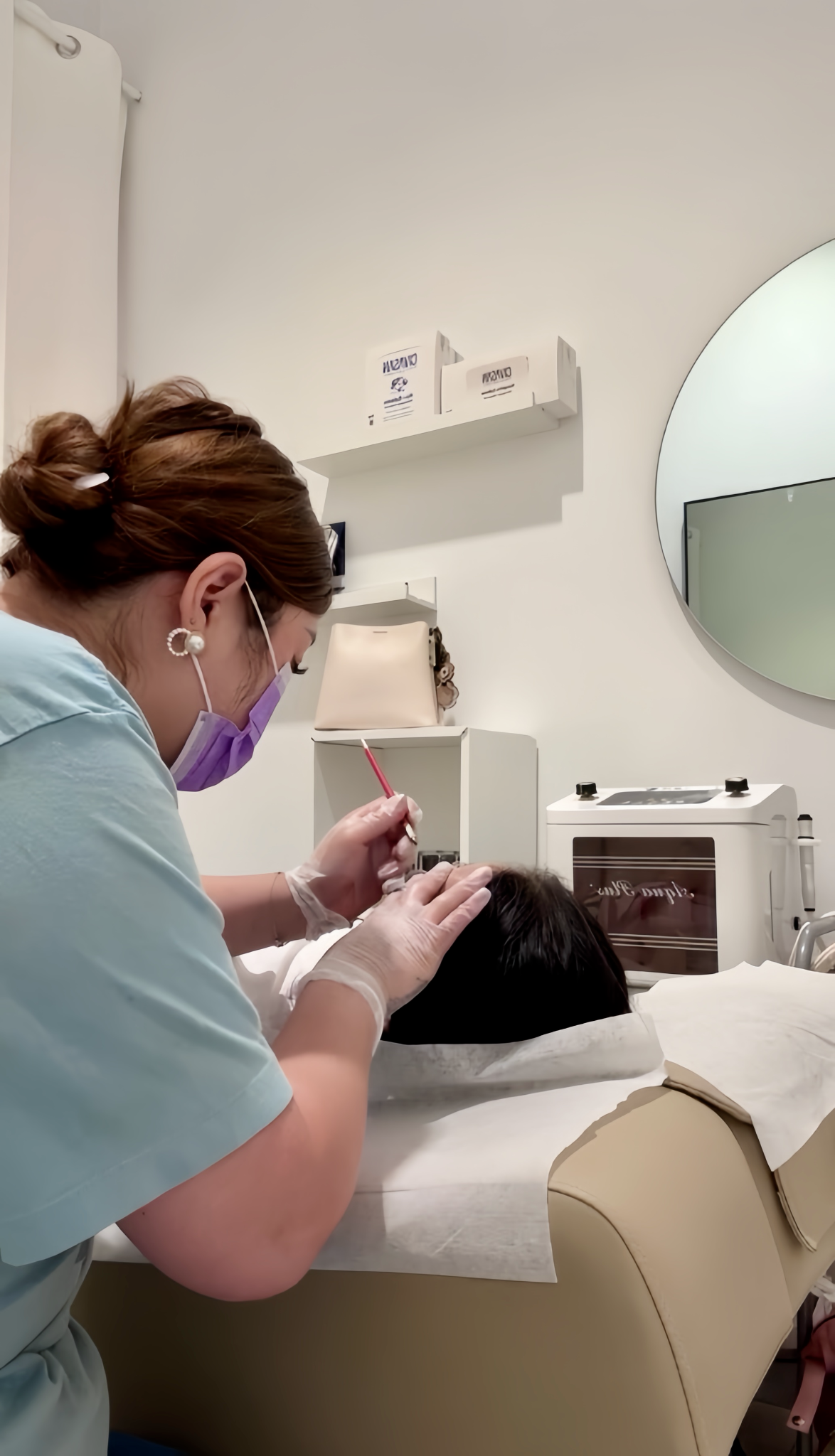 Brow treatment in progress at Foxie Beauty